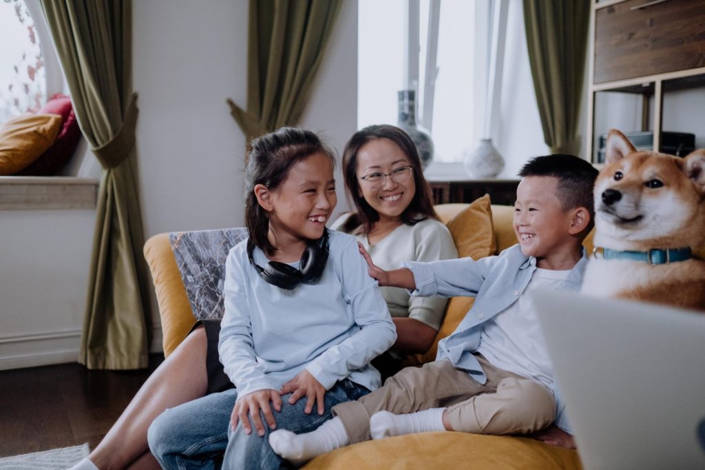 Asian-American family happy and healthy with presumably good mental health.