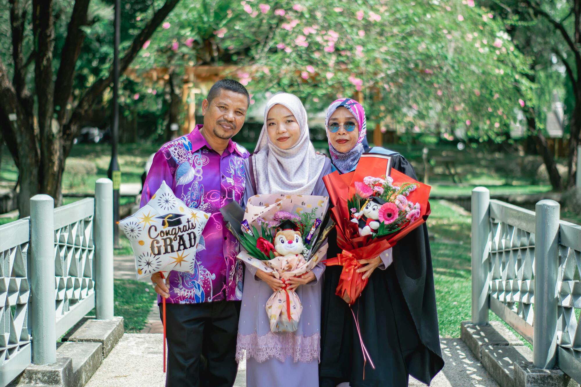 Family and graduate celebrating.